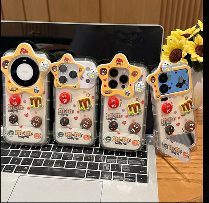 Cute 3D M&M’s Candy Phone Case with Star Camera Frame, Clear TPU Anti-Fall Cover with Foldable Stand & Mirror for iPhone