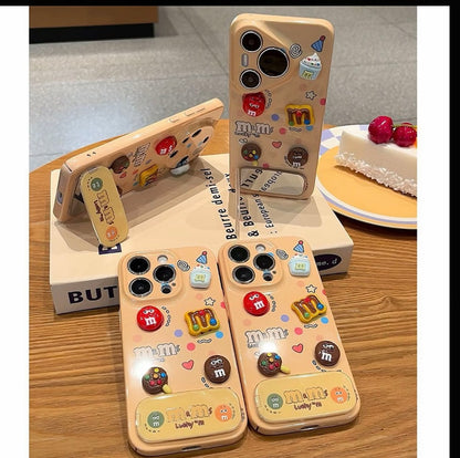 Cute 3D M&M Candy Bean Phone Case Built-in Foldable Makeup Mirror Stand Glossy Shockproof Phone Cover For iPhone